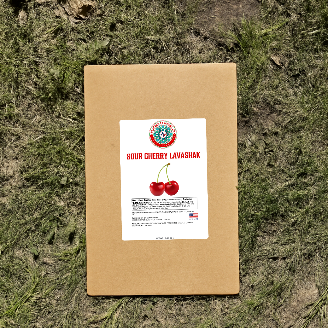  Darband Sour Cherry lavashak sheets side by side, showing the deep ruby red of the plum and the brighter red of the cherry.